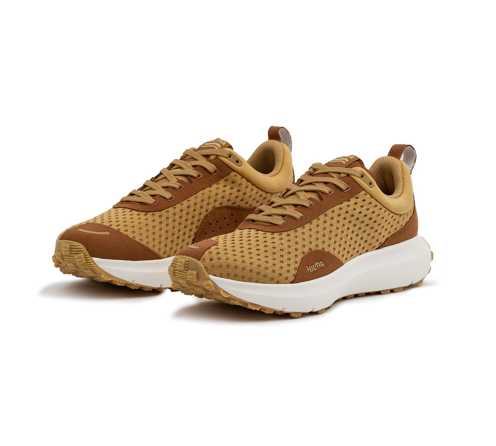 Front side view of a pair of the Everywhere Hilma Running shoe in Sandstone