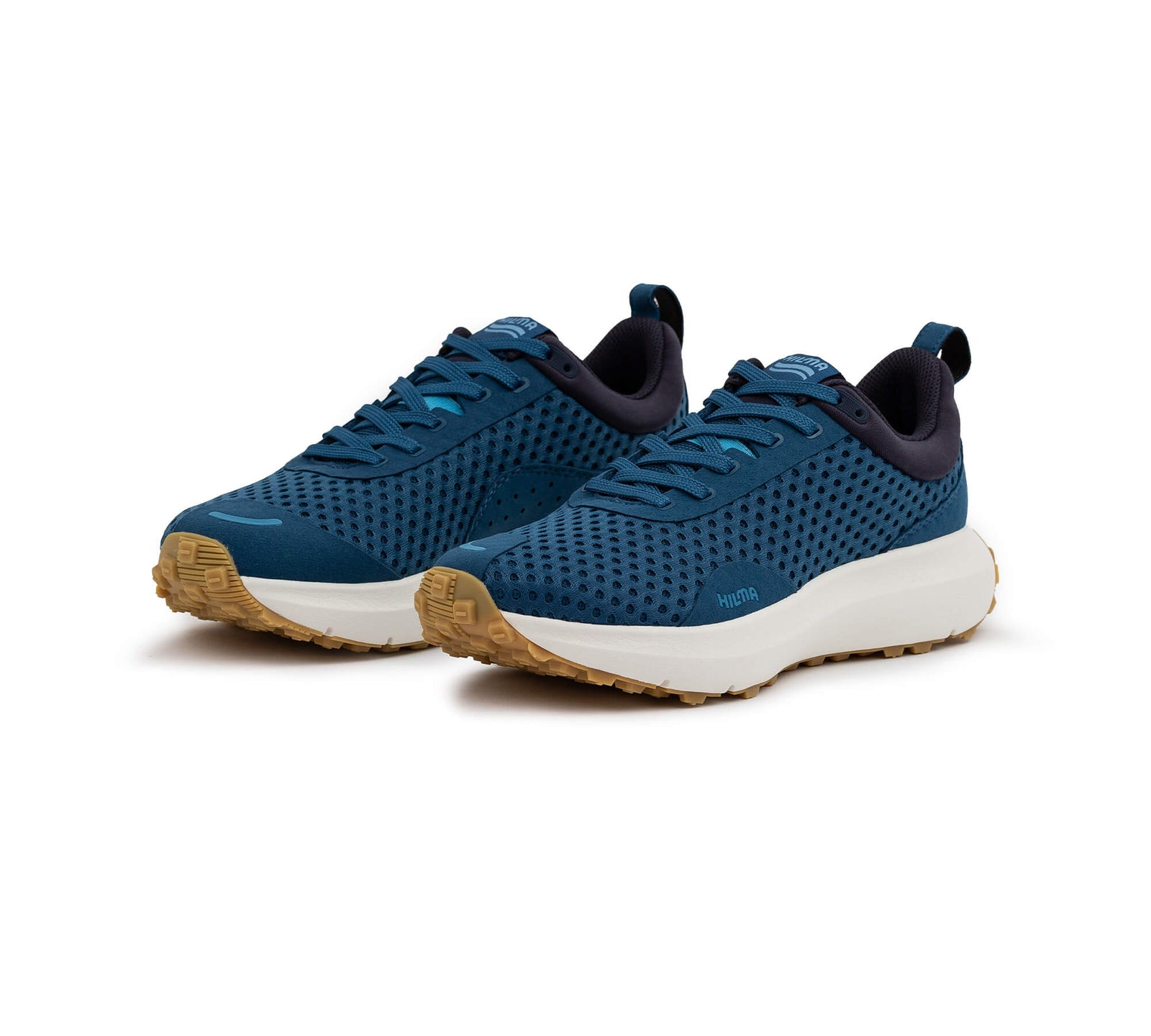Front side view of a pair of the Everywhere Hilma Running shoe in Stelar Blue