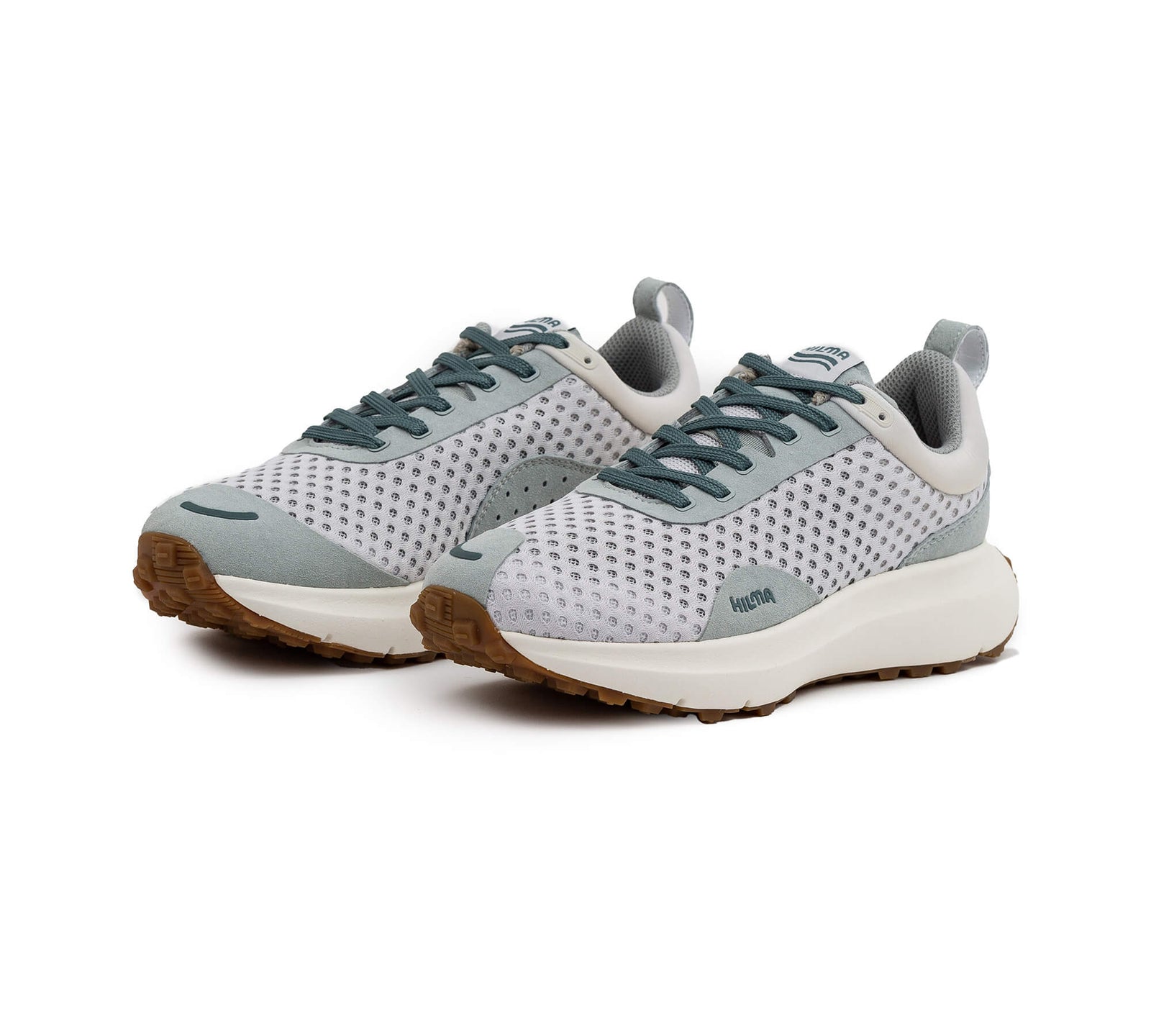 Front side view of a pair of the Everywhere Hilma Running shoe in Mirage Grey