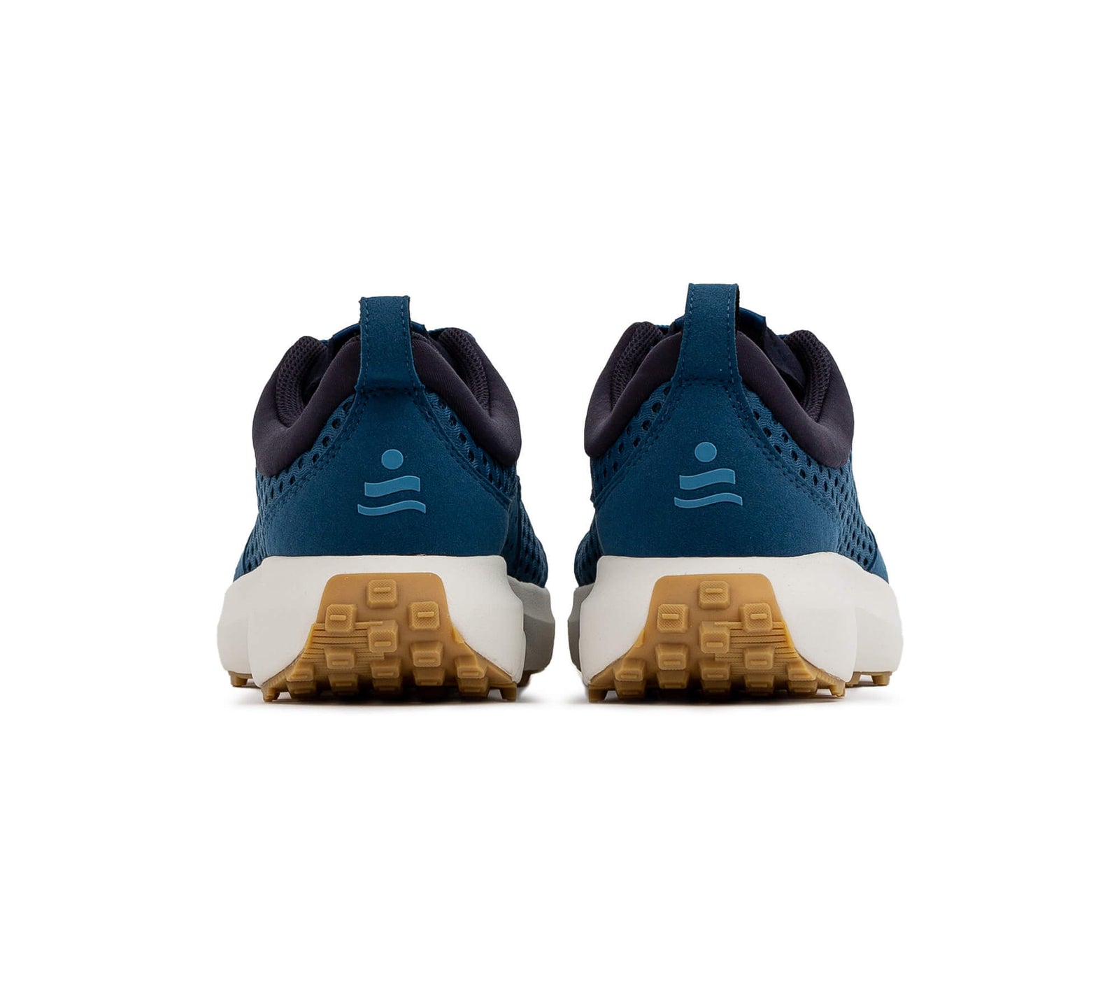 Back view of a pair of the Everywhere Hilma Running shoe in Stellar Blue